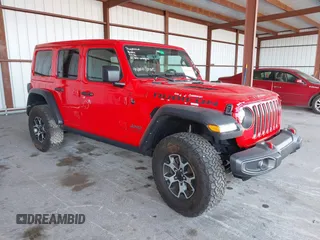 2021 Jeep Wrangler Unlimited Rubicon with VIN 1C4HJXFG8MW785318, listed as a IAAI auction lot 42118969 with 61,572 mi miles and . Bid and sale history available at DreamBid. Image 1.