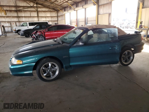 1996 Ford Mustang GT with VIN 1FALP45X5TF226385, listed as a Copart auction lot 43082185 with 21,450 mi miles and Salvage Title. Bid and sale history available at carsss.com. Image 1.
