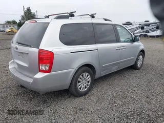 2011 Kia Sedona LX with VIN KNDMG4C7XB6363483, listed as a IAAI auction lot 41884439 with 243,076 mi miles. Bid and sale history available at carsss.com. Image 4.