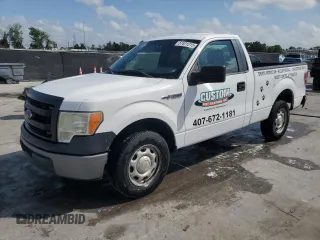 2014 Ford F-150 XL with VIN 1FTMF1CM7EKF39988, listed as a Copart auction lot 51571215 with 129,199 mi miles and Salvage Title. Bid and sale history available at carsss.com. Image 1.