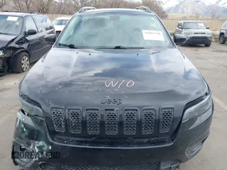 2020 Jeep Cherokee Altitude with VIN 1C4PJMLX9LD634920, listed as a IAAI auction lot 41892720 with 75,388 mi miles and . Bid and sale history available at DreamBid. Image 12.