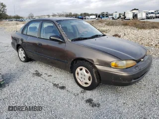 2000 Chevrolet Prizm z VIN 1Y1SK5280YZ405636, wystawiony jako Copart lot #41633235 z przebiegiem Nie podano mil oraz Nie do naprawy • Non repairable. Historia ofert i sprzedaży dostępna na DreamBid. Obrazek 4.