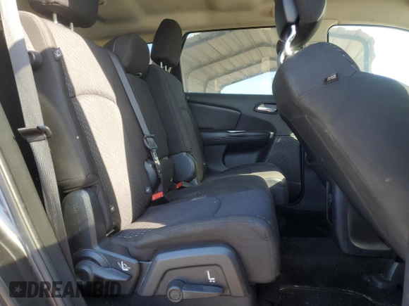 2016 Dodge Journey SE with VIN 3C4PDCABXGT103296, listed as a Copart auction lot 56358715 with 106,821 mi miles and Clean Title. Bid and sale history available at DreamBid. Image 11.