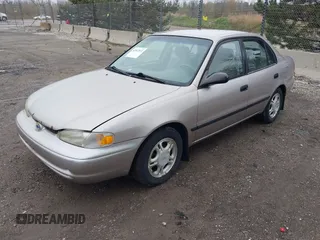 1999 Chevrolet Prizm z VIN 1Y1SK5488XZ446933, wystawiony jako IAAI lot #42167872 z przebiegiem 218 987 mil mil oraz . Historia ofert i sprzedaży dostępna na DreamBid. Obrazek 2.