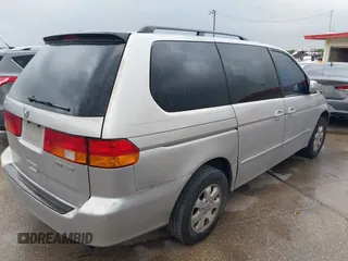 2004 Honda Odyssey EX with VIN 5FNRL18694B076305, listed as a IAAI auction lot 41929212 with 287,717 mi miles and . Bid and sale history available at DreamBid. Image 4.