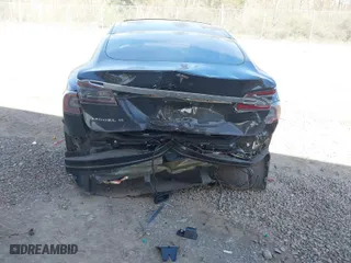 2014 Tesla Model S 60 kWh Battery with VIN 5YJSA1H19EFP45024, listed as a IAAI auction lot 41960222 with 108,573 mi miles. Bid and sale history available at carsss.com. Image 6.