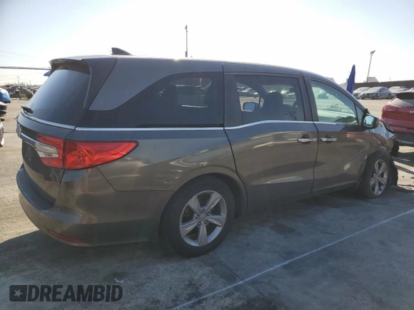 2018 Honda Odyssey EX-L with VIN 5FNRL6H78JB003220, listed as a Copart auction lot 48493355 with 127,807 mi miles and Salvage Title. Bid and sale history available at carsss.com. Image 3.