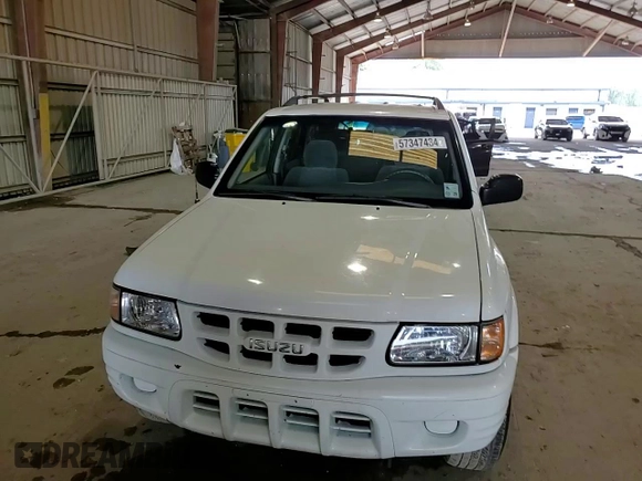 2002 Isuzu Rodeo S with VIN 4S2CK58W724316668, listed as a Copart auction lot 72154754 with 141,590 mi miles and Salvage Title. Bid and sale history available at DreamBid. Image 12.