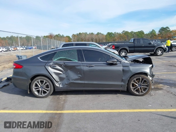 2019 Ford Fusion SEL with VIN 3FA6P0CD9KR252892, listed as a IAAI auction lot 41087776 with 109,498 mi miles and . Bid and sale history available at DreamBid. Image 12.