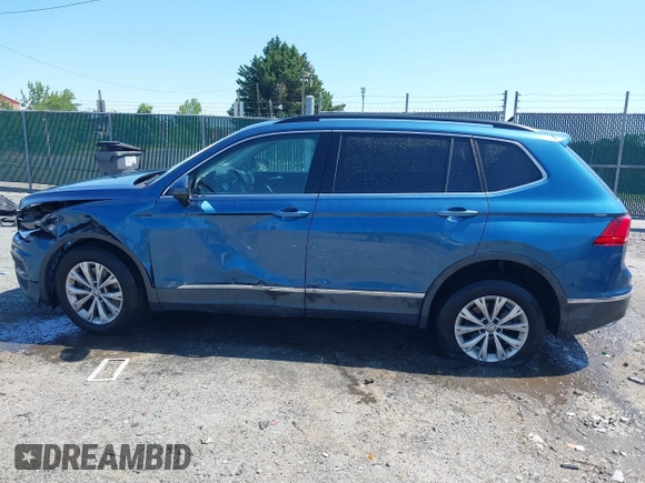 2018 Volkswagen Tiguan SEL with VIN 3VV2B7AX9JM143441, listed as a IAAI auction lot 42351115 with 160,646 mi miles and . Bid and sale history available at DreamBid. Image 14.