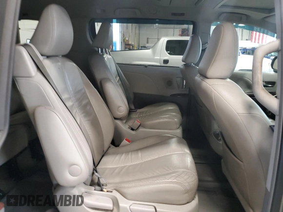 2012 Toyota Sienna XLE with VIN 5TDDK3DC2CS031088, listed as a Copart auction lot 60642845 with 186,586 mi miles and Salvage title. Bid and sale history available at DreamBid. Image 11.