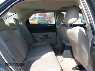 2006 Chrysler 300 C with VIN 2C3KA63H76H141246, listed as a IAAI auction lot 42035339 with 208,798 mi miles. Bid and sale history available at carsss.com. Image 8.