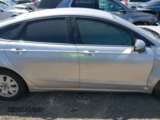 2019 Ford Fusion S with VIN 3FA6P0G71KR275393, listed as a IAAI auction lot 41827288 with 108,160 mi miles and . Bid and sale history available at DreamBid. Image 13.