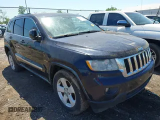 2011 Jeep Grand Cherokee Laredo with VIN 1J4RR4GG8BC525701, listed as a IAAI auction lot 42240431 with 198,921 mi miles and . Bid and sale history available at DreamBid. Image 1.