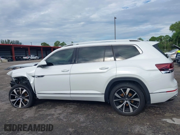2024 Volkswagen Atlas SEL Premium R-Line z VIN 1V2FR2CA3RC528268, wystawiony jako IAAI lot #40248966 z przebiegiem 13 401 mil mil oraz . Historia ofert i sprzedaży dostępna na DreamBid. Obrazek 14.