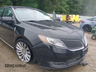 2014 Lincoln MKS z VIN 1LNHL9DK0EG610145, wystawiony jako IAAI lot #42348345 z przebiegiem 61 289 mil mil oraz . Historia ofert i sprzedaży dostępna na DreamBid. Obrazek 6.