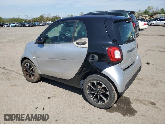 2016 Smart fortwo Passion with VIN WMEFJ5DA2GK069795, listed as a Copart auction lot 55079085 with 153,339 mi miles and Clean Title. Bid and sale history available at DreamBid. Image 2.