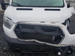 2023 Ford Transit Cargo with VIN 1FTBW3X83PKA13800, listed as a Copart auction lot 83735954 with 37,252 mi miles and Salvage Title. Bid and sale history available at carsss.com. Image 12.