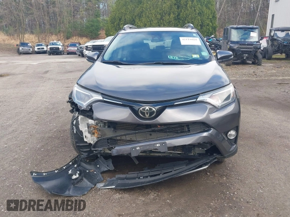 2018 Toyota RAV4 XLE z VIN 2T3WFREV9JW445903, wystawiony jako IAAI lot #42119869 z przebiegiem 47 866 mil mil oraz . Historia ofert i sprzedaży dostępna na DreamBid. Obrazek 12.