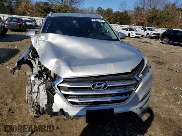 2017 Hyundai Tucson SE with VIN KM8J33A46HU519309, listed as a Copart auction lot 42677955 with 127,202 mi miles and Salvage Title. Bid and sale history available at DreamBid. Image 5.
