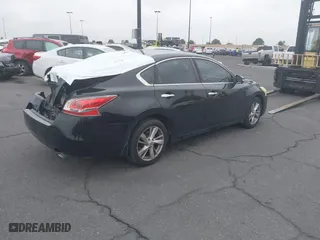 2015 Nissan Altima 2.5 SV with VIN 1N4AL3AP6FC277466, listed as a IAAI auction lot 42042276 with 118,806 mi miles. Bid and sale history available at carsss.com. Image 4.
