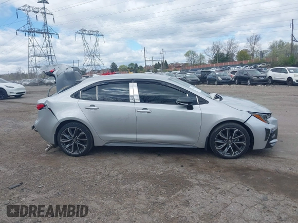 2021 Toyota Corolla SE with VIN 5YFS4MCE2MP066802, listed as a IAAI auction lot 42031552 with 34,075 mi miles. Bid and sale history available at carsss.com. Image 14.