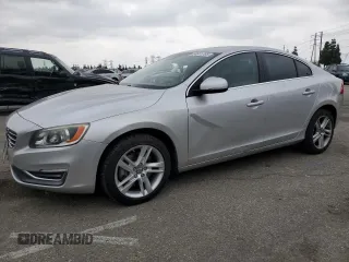 2014 Volvo S60 T5 with VIN YV1612FS4E1292856, listed as a Copart auction lot 50951795 with 121,283 mi miles and Salvage Title. Bid and sale history available at carsss.com. Image 1.