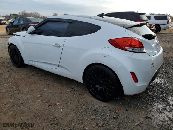 2014 Hyundai Veloster RE:FLEX with VIN KMHTC6AD0EU211963, listed as a Copart auction lot 87314974 with 140,143 mi miles and Salvage Title. Bid and sale history available at carsss.com. Image 2.