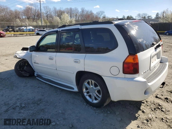2007 GMC Envoy Denali with VIN 1GKET63MX72296808, listed as a Copart auction lot 50566995 with 173,244 mi miles and Salvage Title. Bid and sale history available at carsss.com. Image 2.