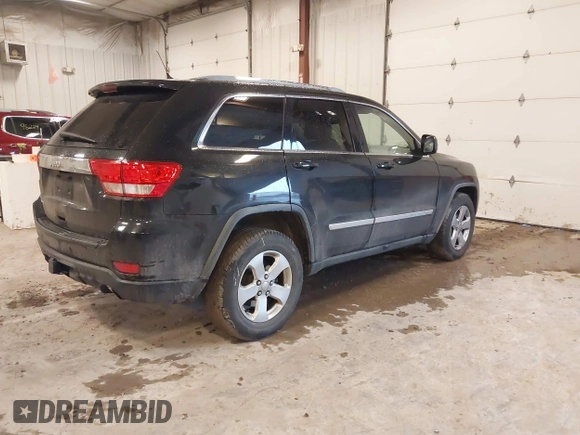 2012 Jeep Grand Cherokee Laredo with VIN 1C4RJFAT1CC225479, listed as a IAAI auction lot 41709911 with 227,150 mi miles. Bid and sale history available at carsss.com. Image 4.