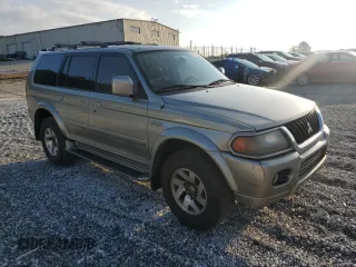 2002 Mitsubishi Montero Limited z VIN JA4LS41R32J066917, wystawiony jako Copart lot #71118894 z przebiegiem 185 475 mil mil oraz Szkody całkowita. Historia ofert i sprzedaży dostępna na DreamBid. Obrazek 4.