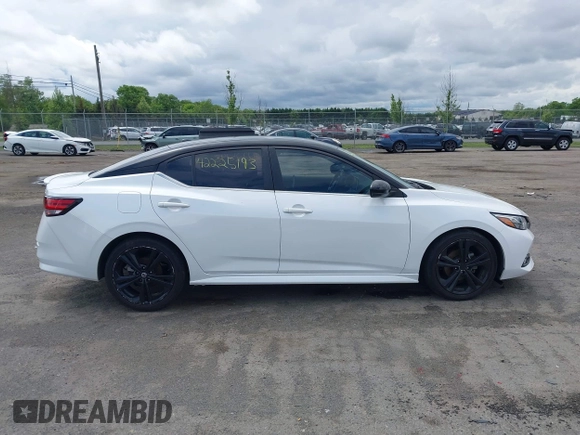 2020 Nissan Sentra SR z VIN 3N1AB8DV6LY228861, wystawiony jako IAAI lot #42225193 z przebiegiem 91 399 mil mil oraz . Historia ofert i sprzedaży dostępna na DreamBid. Obrazek 13.