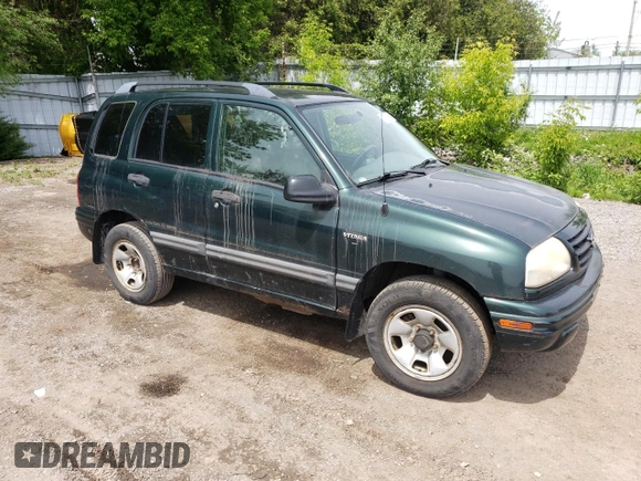 2003 Suzuki Vitara JLX z VIN 2S3TD52V136101732, wystawiony jako Copart lot #58477845 z przebiegiem 105 628 mil mil oraz Czysty tytuł • Clean title. Historia ofert i sprzedaży dostępna na DreamBid. Obrazek 4.
