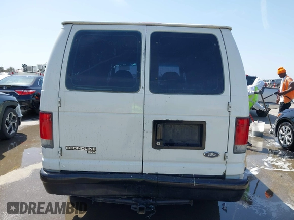 1998 Ford Econoline Cargo with VIN 1FTRE1420WHB15038, listed as a IAAI auction lot 41826051 with 338,809 mi miles. Bid and sale history available at carsss.com. Image 16.