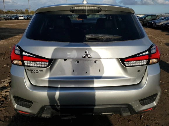 2022 Mitsubishi Outlander SE с VIN JA4APVAU2NU008495, выставлен на аукционе Copart как лот 85111664 с пробегом 60 052 миль миль и Списание • Salvage title. История ставок и продаж доступна на DreamBid. Изображение 6.