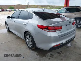2018 Kia Optima LX z VIN 5XXGT4L3XJG231457, wystawiony jako IAAI lot #42255585 z przebiegiem 75 877 mil mil oraz . Historia ofert i sprzedaży dostępna na DreamBid. Obrazek 3.