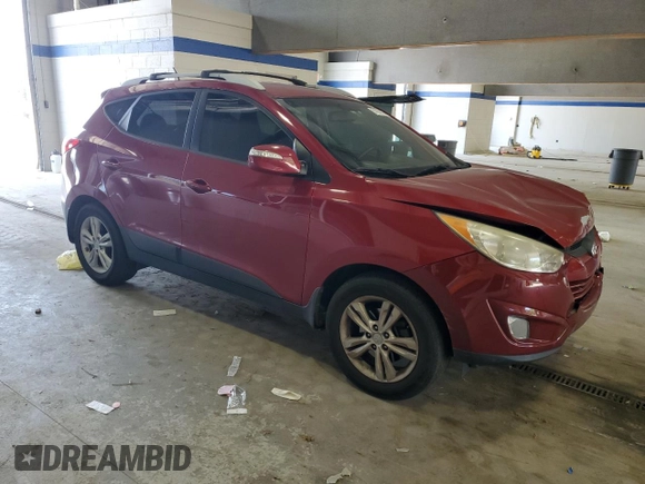 2013 Hyundai Tucson GLS with VIN KM8JU3AC7DU614962, listed as a Copart auction lot 51957675 with 112,942 mi miles and Salvage Title. Bid and sale history available at carsss.com. Image 4.