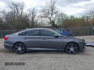 2021 Honda Accord Touring with VIN 1HGCV3F90MA001513, listed as a IAAI auction lot 41939003 with 107,246 mi miles and . Bid and sale history available at DreamBid. Image 14.