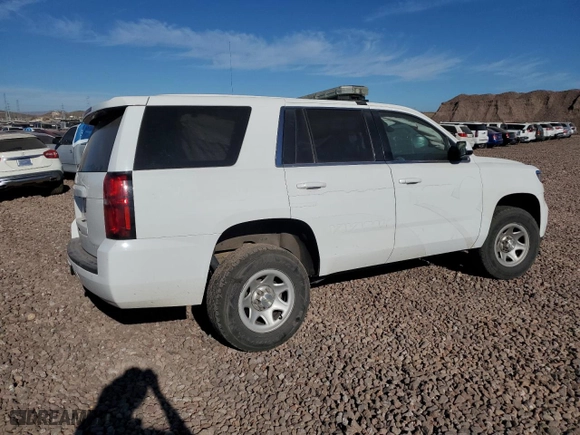 2016 Chevrolet Tahoe Commercial with VIN 1GNSKFEC2GR266027, listed as a Copart auction lot 84628234 with 135,689 mi miles and Salvage Title. Bid and sale history available at carsss.com. Image 3.
