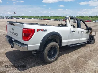 2021 Ford F-150 XL z VIN 1FTFW1E15MFC73857, wystawiony jako IAAI lot #42341451 z przebiegiem 59 500 mil mil oraz . Historia ofert i sprzedaży dostępna na DreamBid. Obrazek 4.