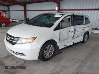 2015 Honda Odyssey EX-L with VIN 5FNRL5H64FB084175, listed as a IAAI auction lot 41943540 with 67,902 mi miles and . Bid and sale history available at carsss.com. Image 2.