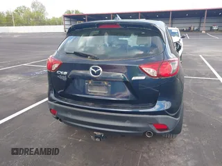 2016 Mazda CX-5 Sport with VIN JM3KE2BY3G0740488, listed as a IAAI auction lot 42000449 with 43,009 mi miles. Bid and sale history available at carsss.com. Image 16.