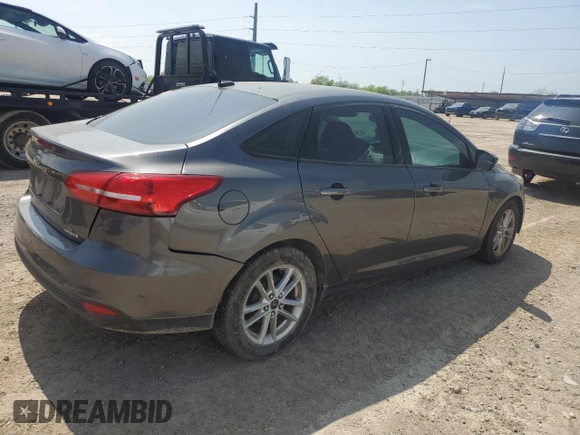 2016 Ford Focus SE with VIN 1FADP3F28GL267599, listed as a Copart auction lot 50965695 with 140,950 mi miles and Clean Title. Bid and sale history available at carsss.com. Image 3.