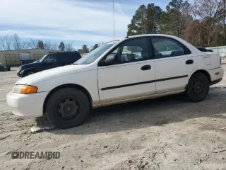 1998 Mazda Protege DX with VIN JM1BC1416W0194406, listed as a Copart auction lot 44535955 with 312,942 mi miles and Salvage Title. Bid and sale history available at DreamBid. Image 1.