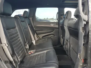 2021 Jeep Grand Cherokee 80th Anniversary z VIN 1C4RJEBG1MC844595, wystawiony jako Copart lot #54899195 z przebiegiem 19 287 mil mil oraz Szkoda całkowita • Salvage title. Historia ofert i sprzedaży dostępna na DreamBid. Obrazek 11.