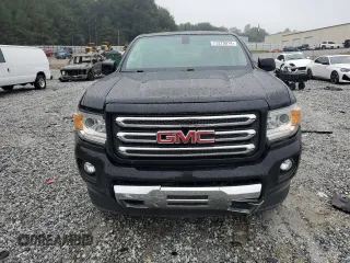 2015 GMC Canyon 4WD SLE with VIN 1GTG6BE37F1157166, listed as a Copart auction lot 71279914 with 114,484 mi miles and Salvage Title. Bid and sale history available at carsss.com. Image 5.
