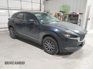 2023 Mazda CX-30 S with VIN 3MVDMBAM9PM586335, listed as a IAAI auction lot 41392541 with 12,463 mi miles and . Bid and sale history available at carsss.com. Image 1.