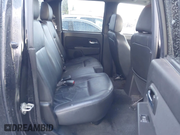 2010 GMC Canyon z VIN 1GTJSFDP6A8134412, wystawiony jako IAAI lot #41589150 z przebiegiem 164 232 mil mil oraz . Historia ofert i sprzedaży dostępna na DreamBid. Obrazek 8.