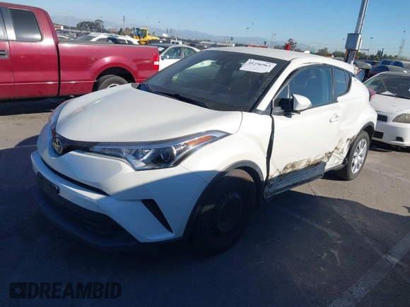 2019 Toyota C-HR XLE with VIN JTNKHMBX4K1058916, listed as a IAAI auction lot 41296963 with 113,290 mi miles. Bid and sale history available at carsss.com. Image 17.