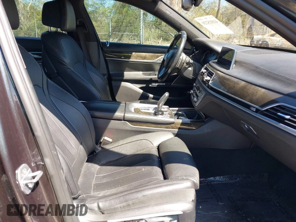 2016 BMW 7 Series 740i with VIN WBA7E2C54GG714649, listed as a IAAI auction lot 41815220 with 89,029 mi miles. Bid and sale history available at carsss.com. Image 5.